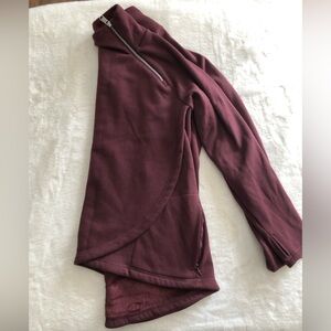 Maroon athleta sweatshirt. Fleece-lined. Has pockets and thumb holes.